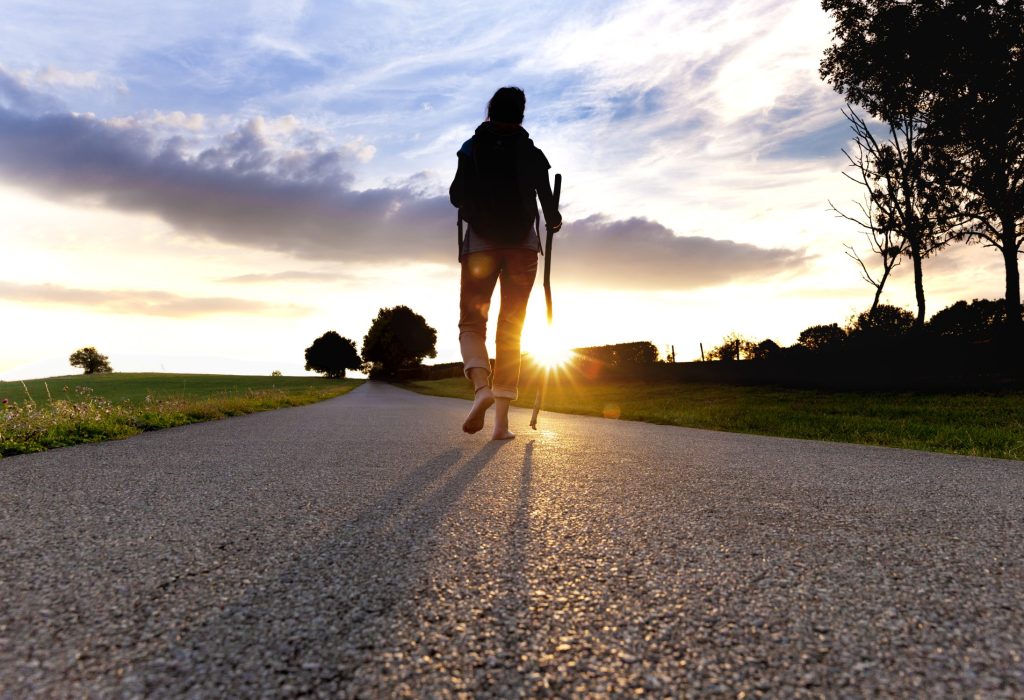 Pilgrim woman at Sunset